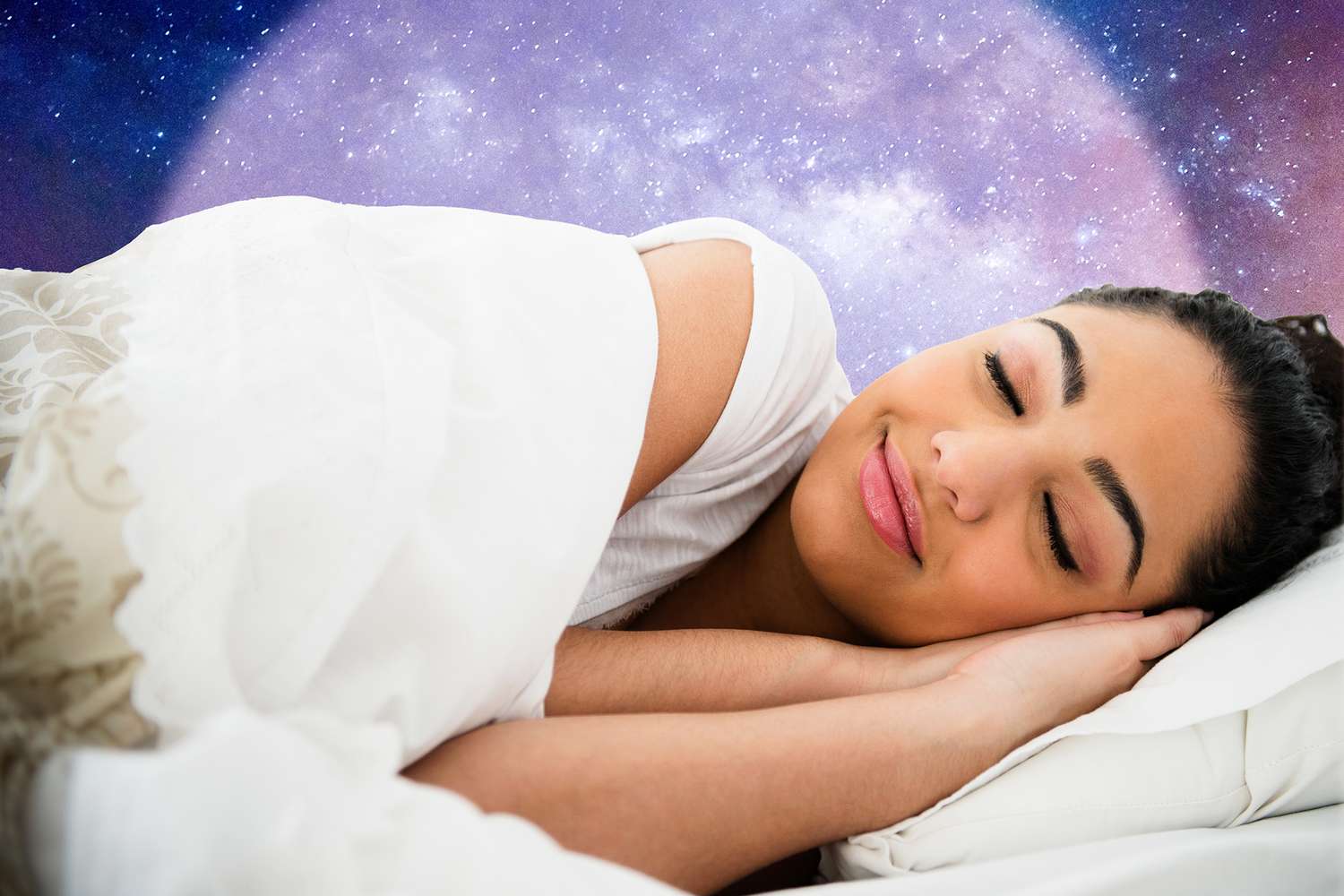 woman sleeping in bed with stars in thee background