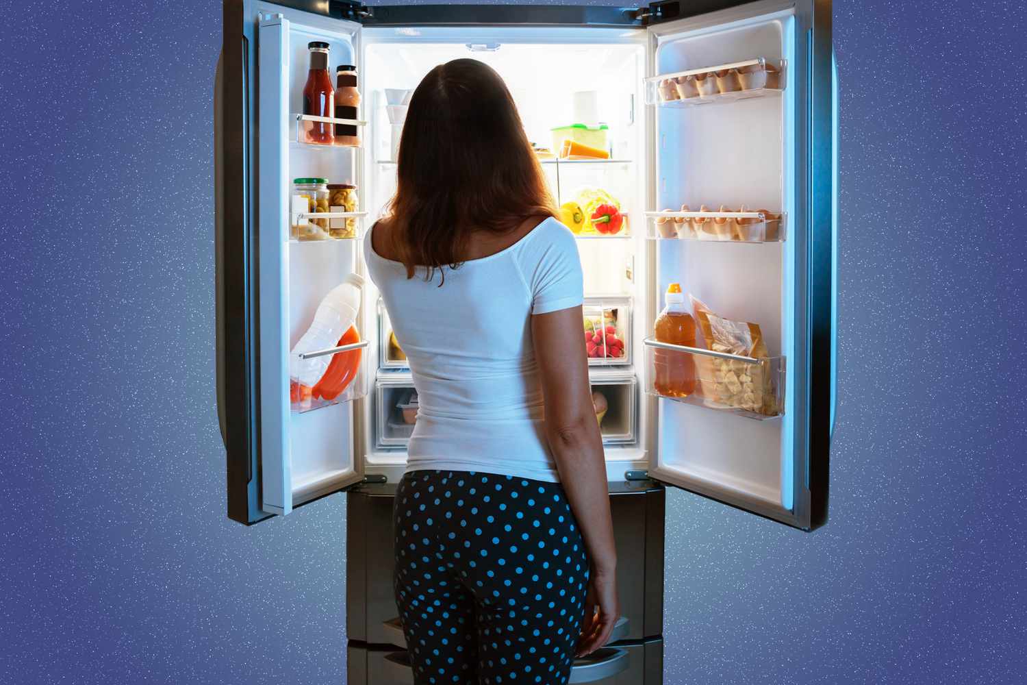 A woman looking in a fridge at night on a designed background