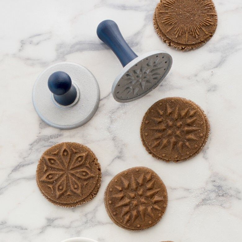 cookies and stamps on marble counter