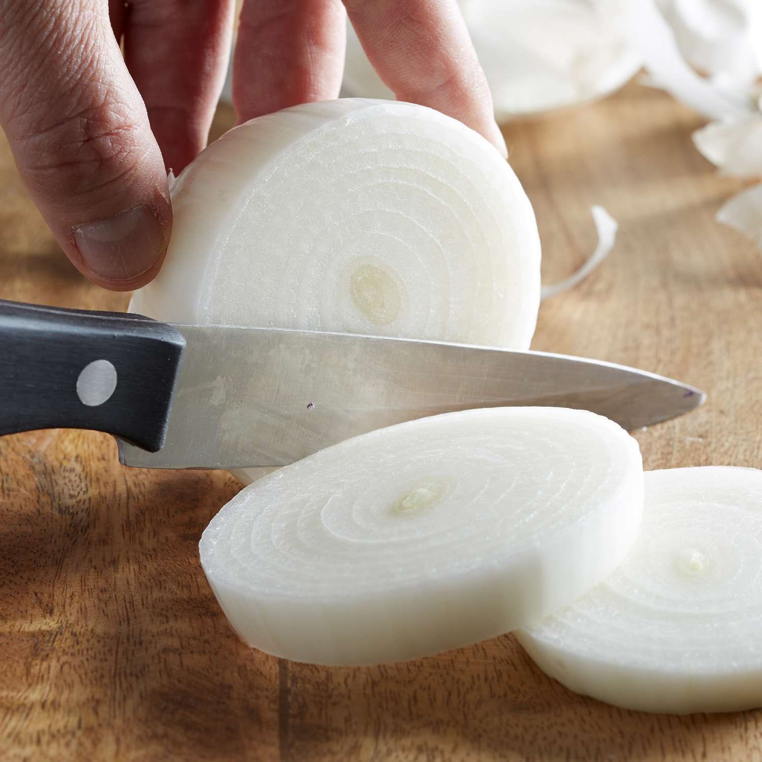 Close up of slicing an onion