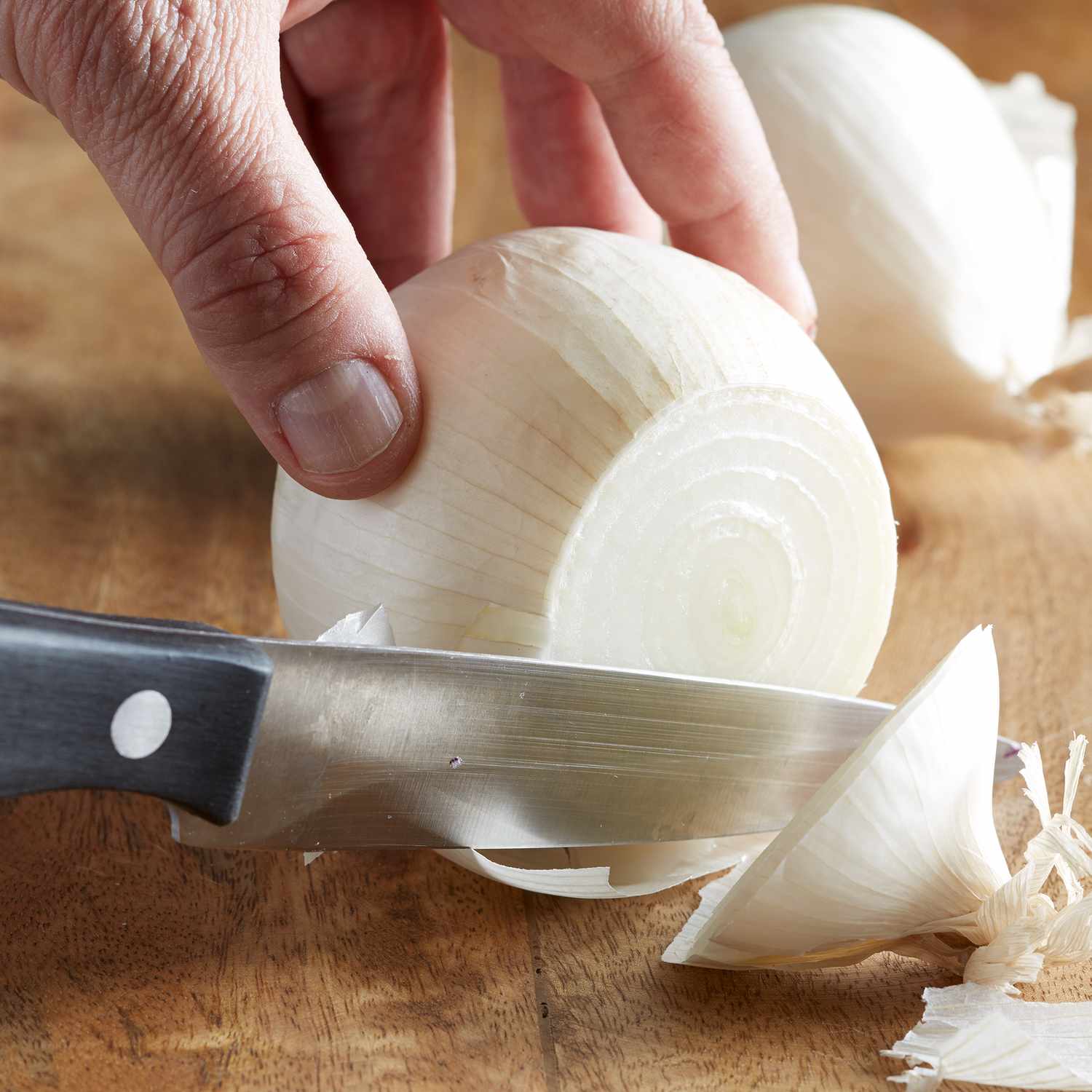 Close up of cutting an onion