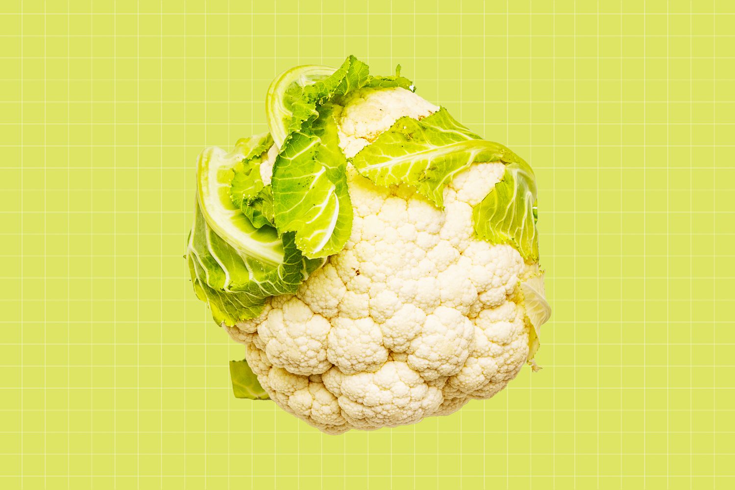 A head of cauliflower on a designed background
