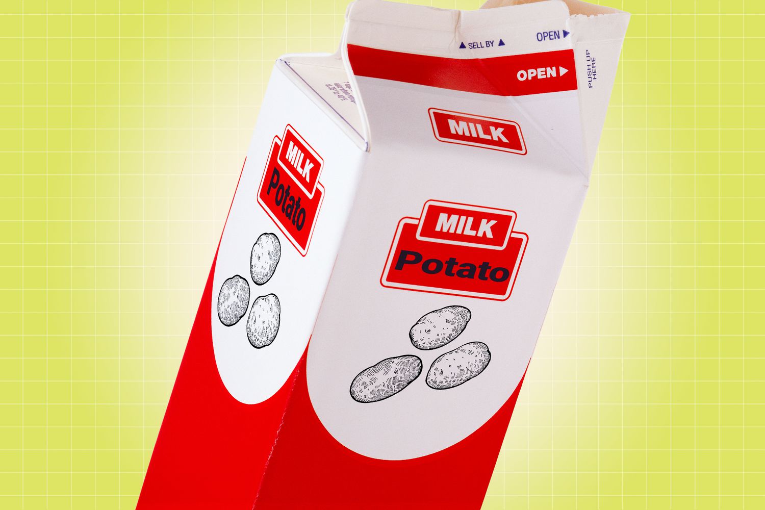 a carton of potato milk on a designed background