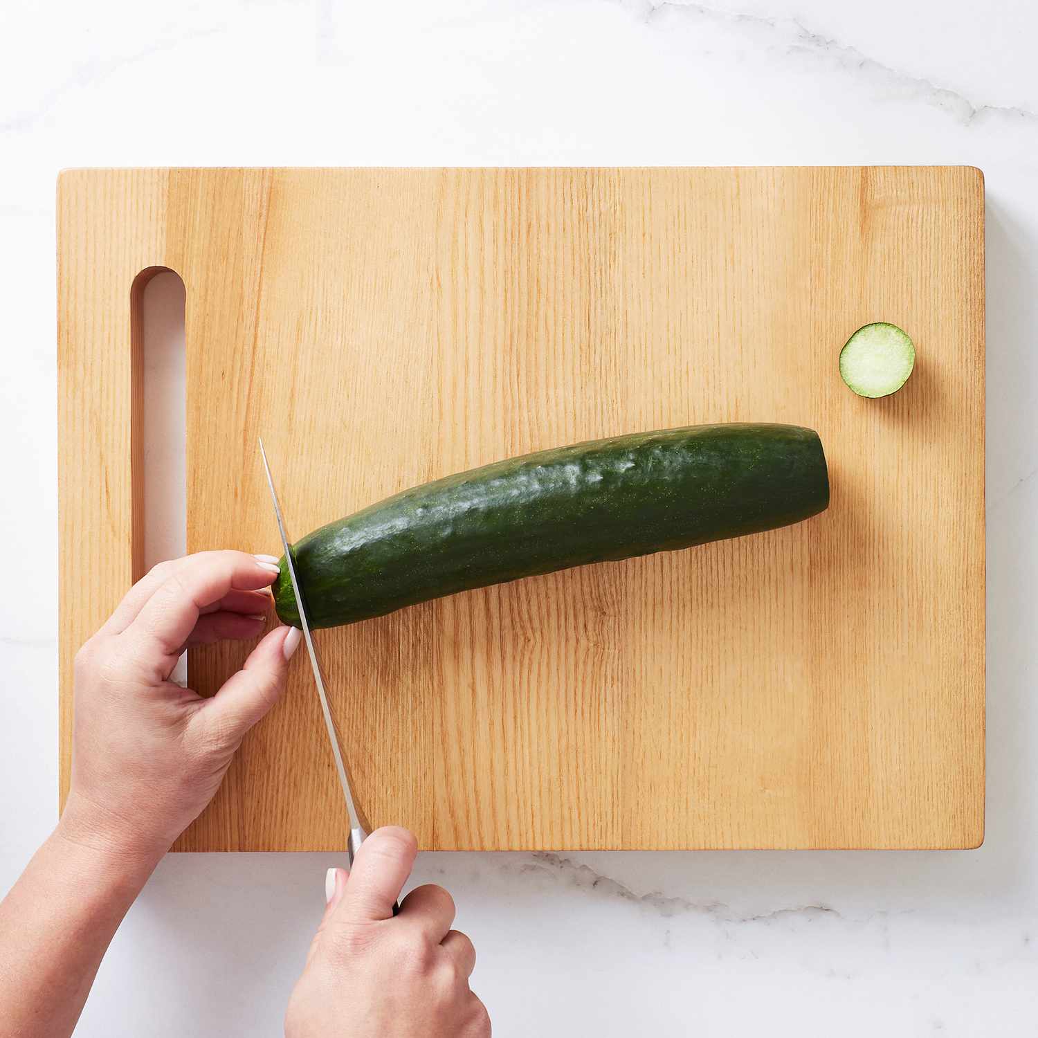 Close up of cutting a cucumber