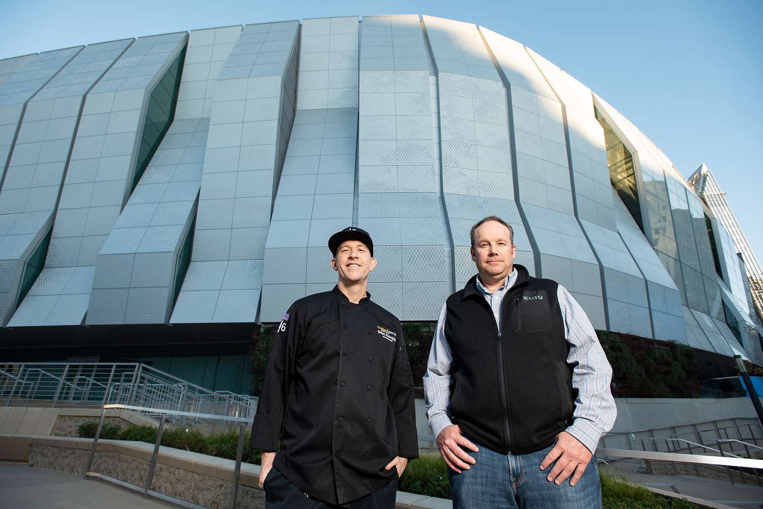Executive chef Brien Kuznicki (left) and farmer Michael Bosworth at Sacramento’s Golden 1 Center.