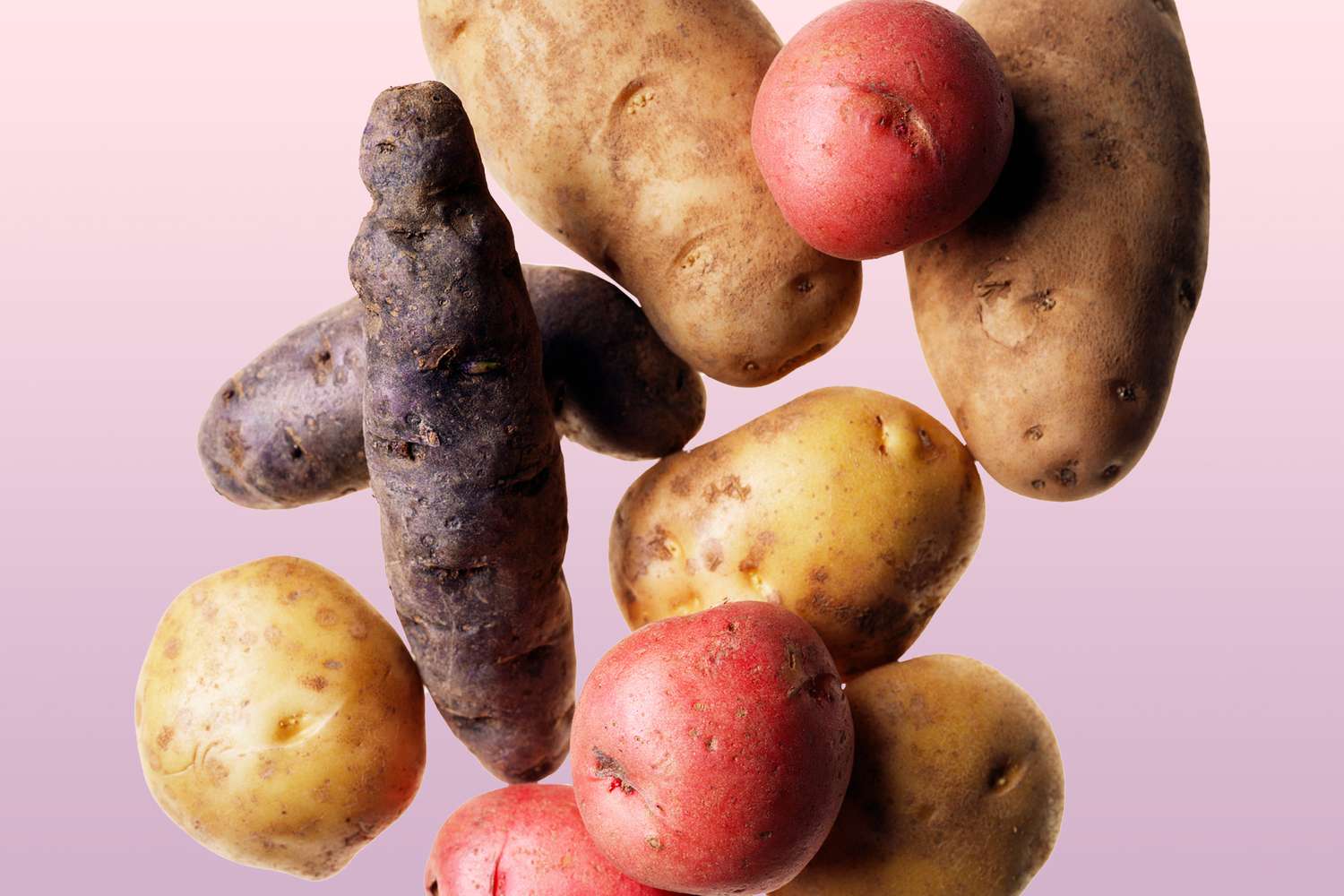 A mix of different potatoes on a designed background