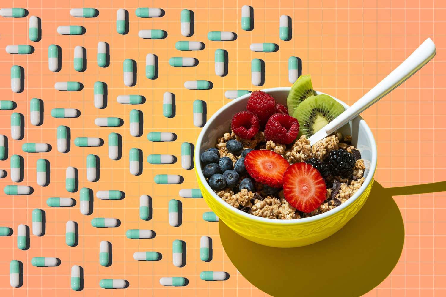 granola and fruit and pills on a designed surface