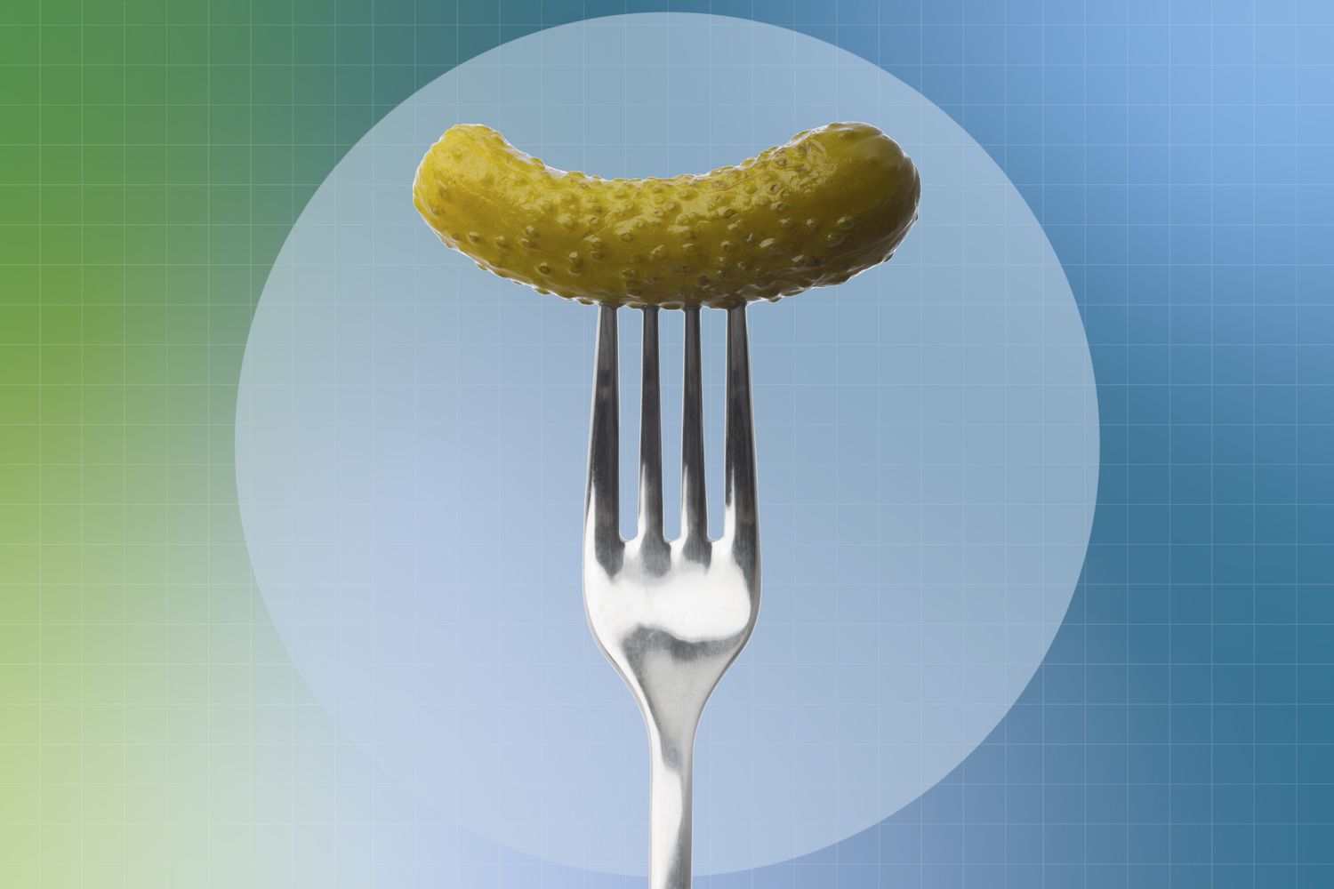image of a fork holding up a small pickle