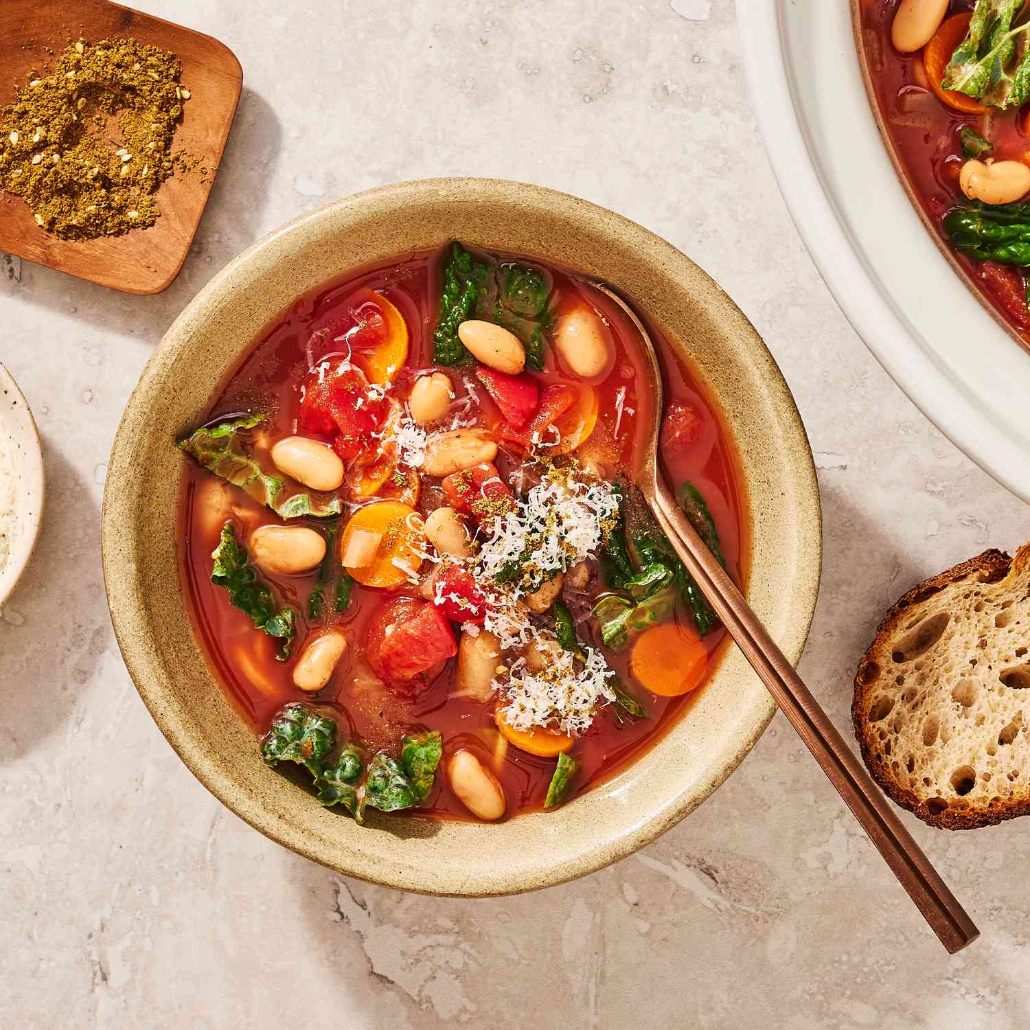 a recipe photo of the Kale White Bean Stew served in a bowl