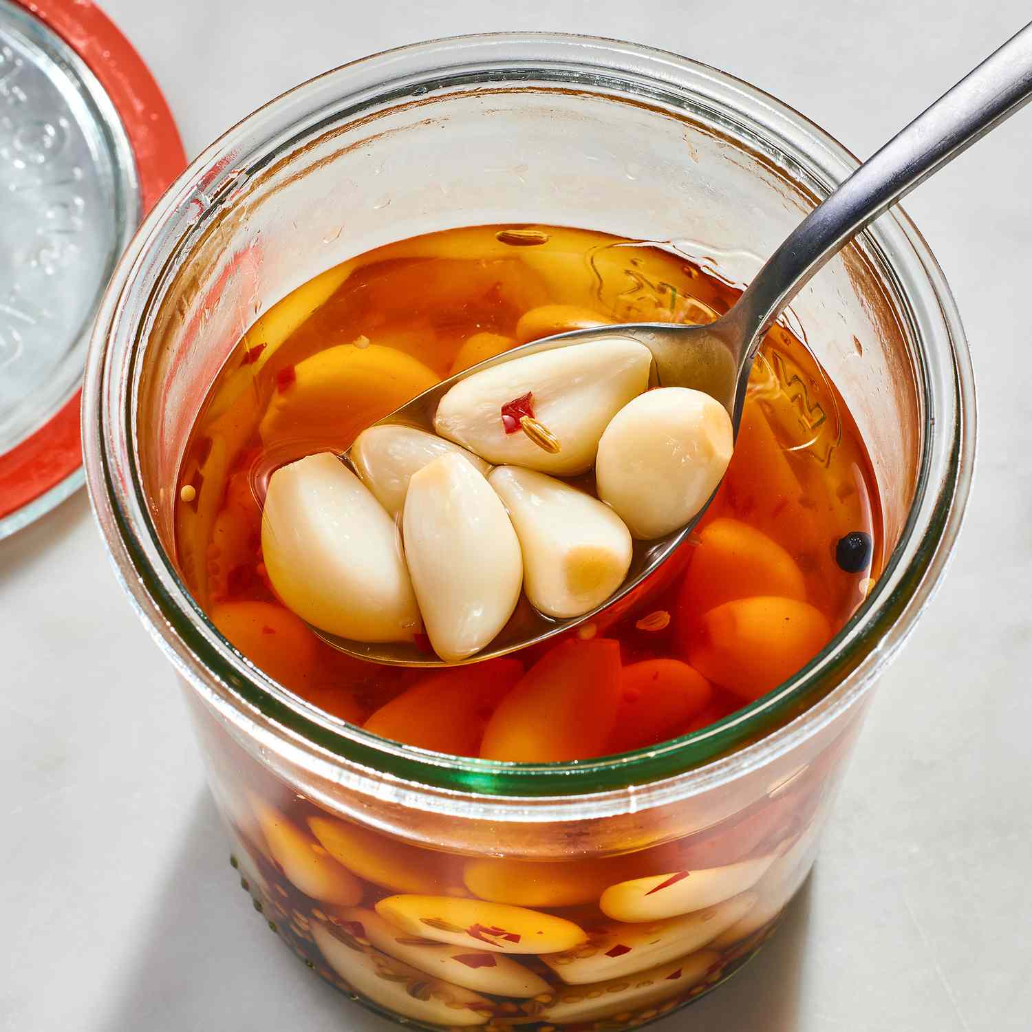 a recipe photo of the Pickled Garlic Cloves in a jar