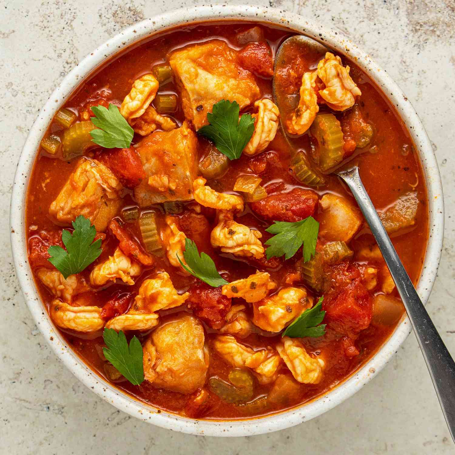 a recipe photo of the Shrimp & Fish Stew served in a bowl