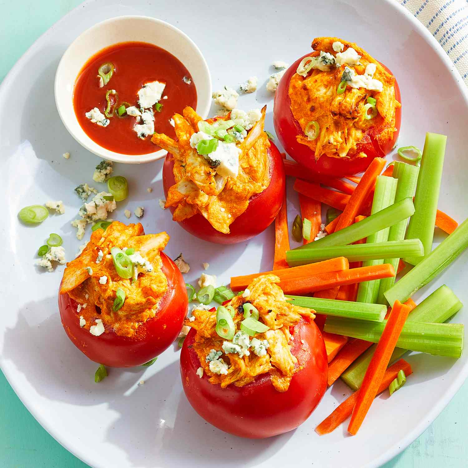 a recipe photo of the Air-Fryer Buffalo Chicken-Stuffed Tomatoes