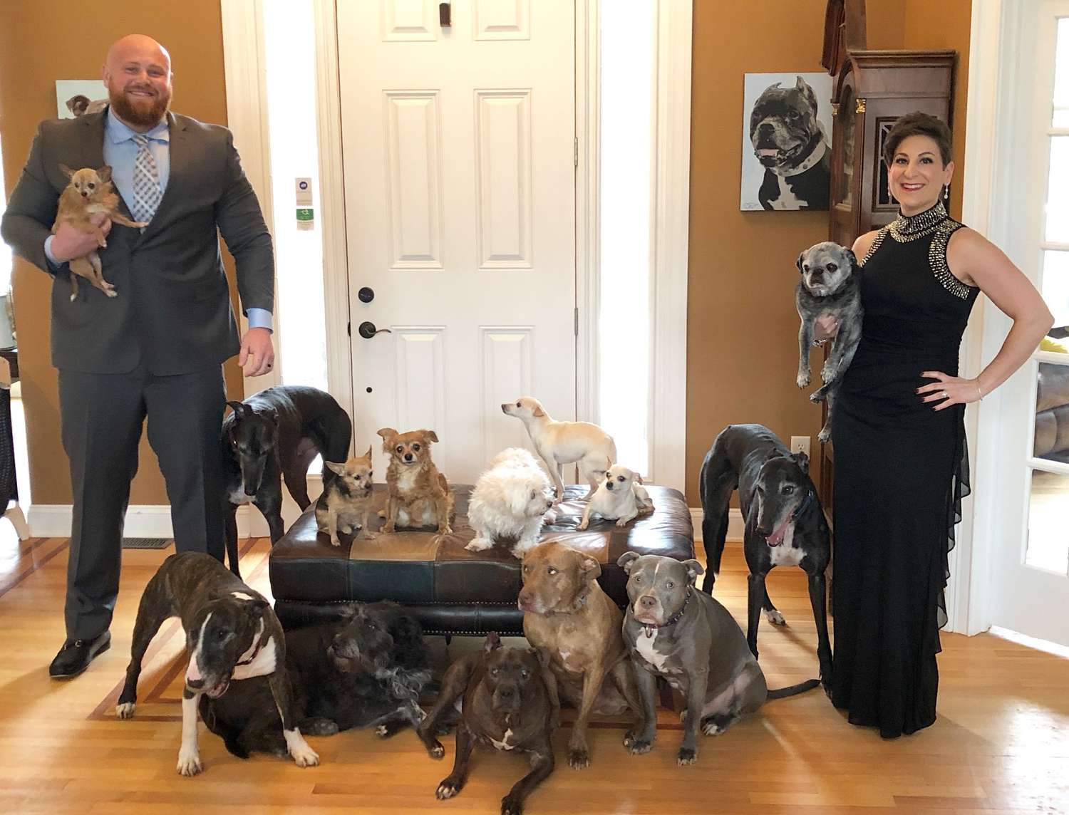 Chris and Mariesa Hughes with 14 Dogs