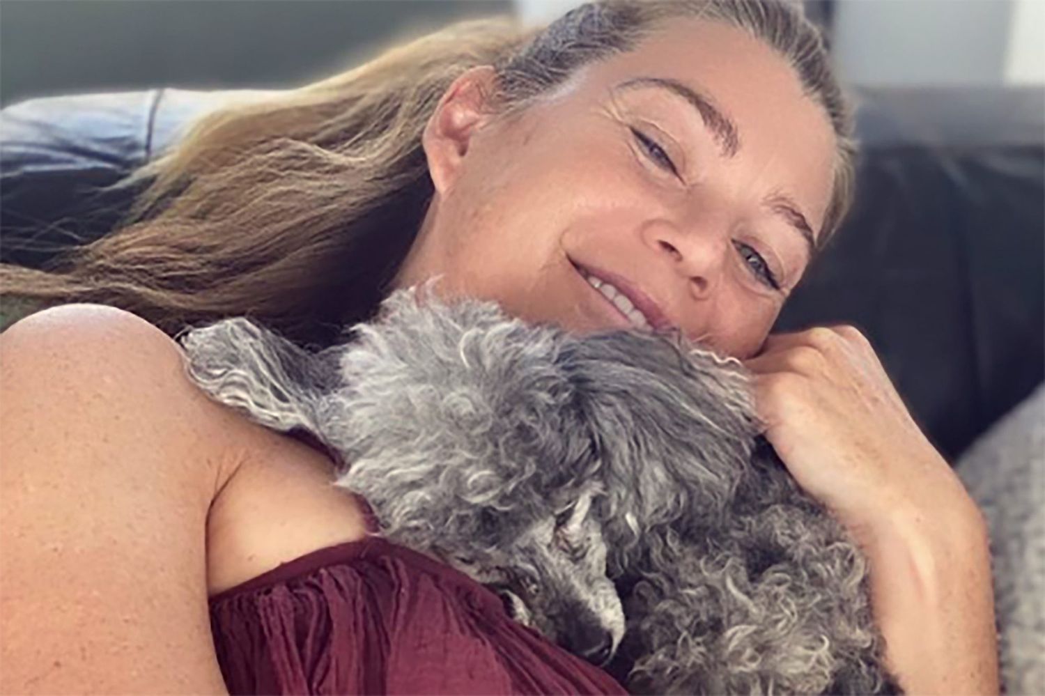 Ellen Pompeo snuggling with her dog
