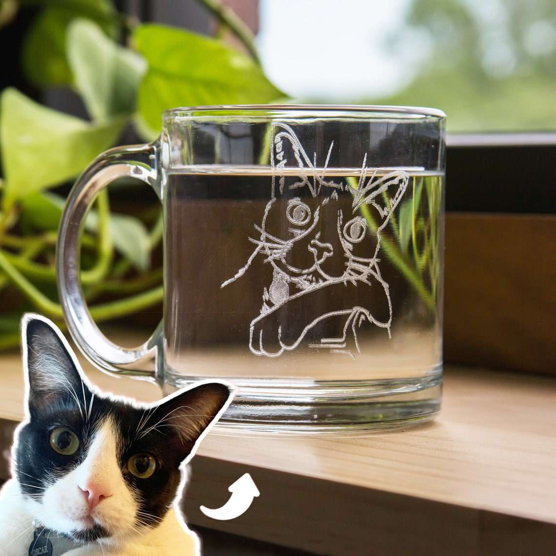 Photo of a Custom Pet Portrait Etched on Glass sitting on a wooden surface next to a window