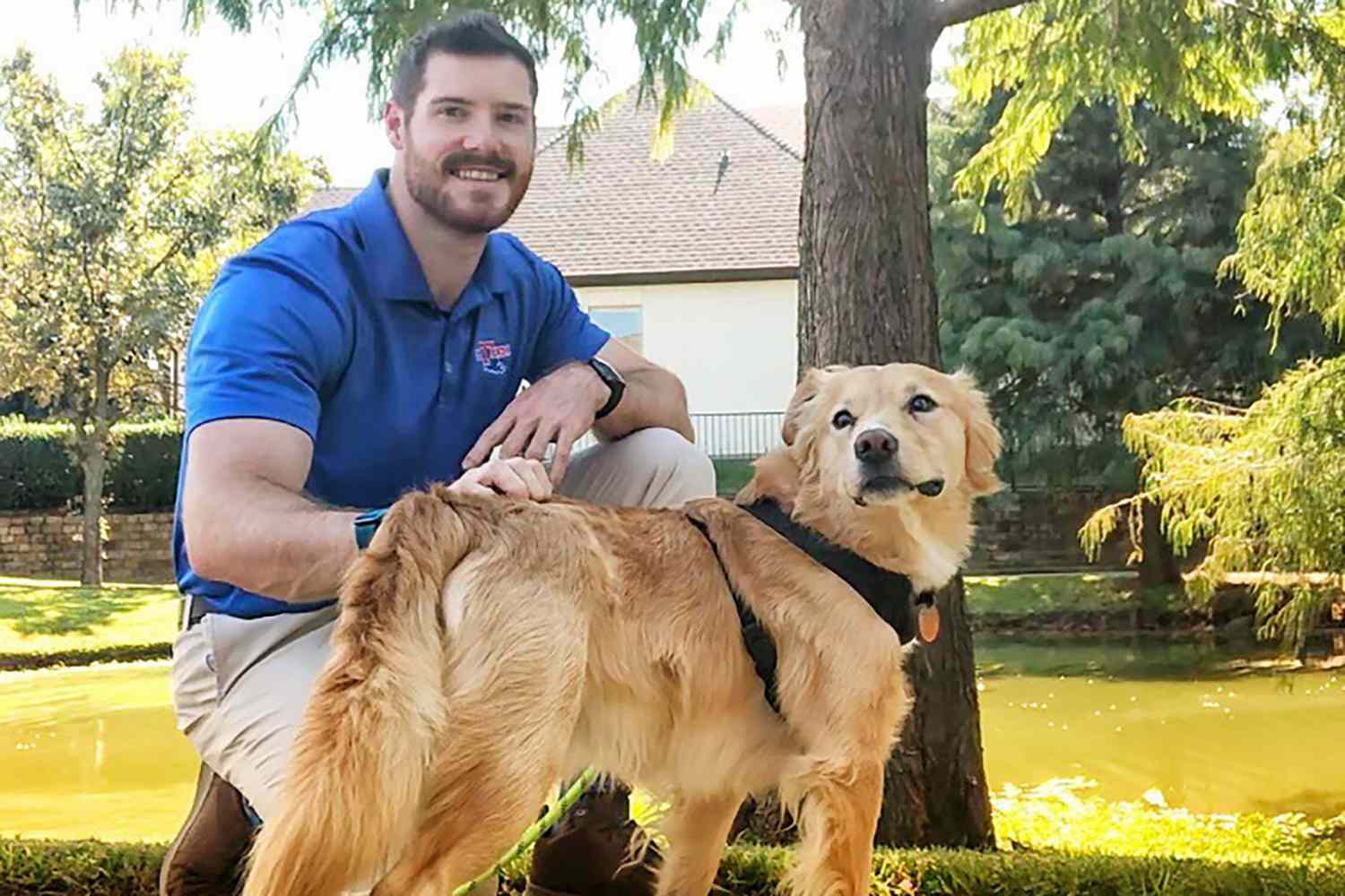 Dr. Hunter Finn with golden retriever in front of pond, whose advice is going viral on TikTok