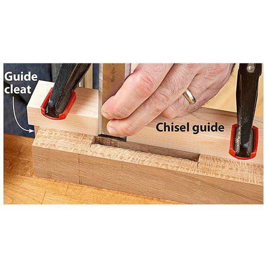Chisel on top of board