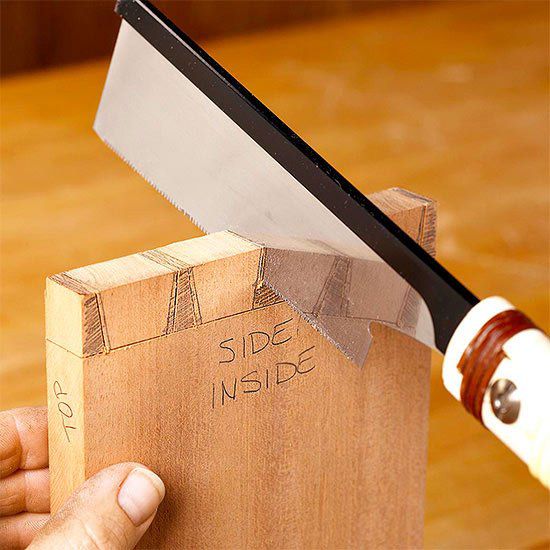 Cutting board with saw Side inside