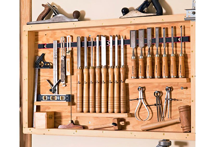 Rack on wall with tools