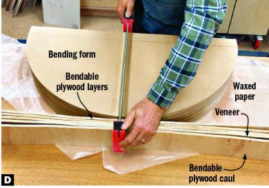 Clamping several bendable layers of plywood to the front of a half round table top.