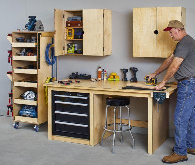 Cabinet functions as workbench and tool storage.