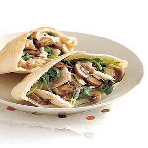 Overstuffed Chicken Pitas with Mushrooms and Wilted Arugula 