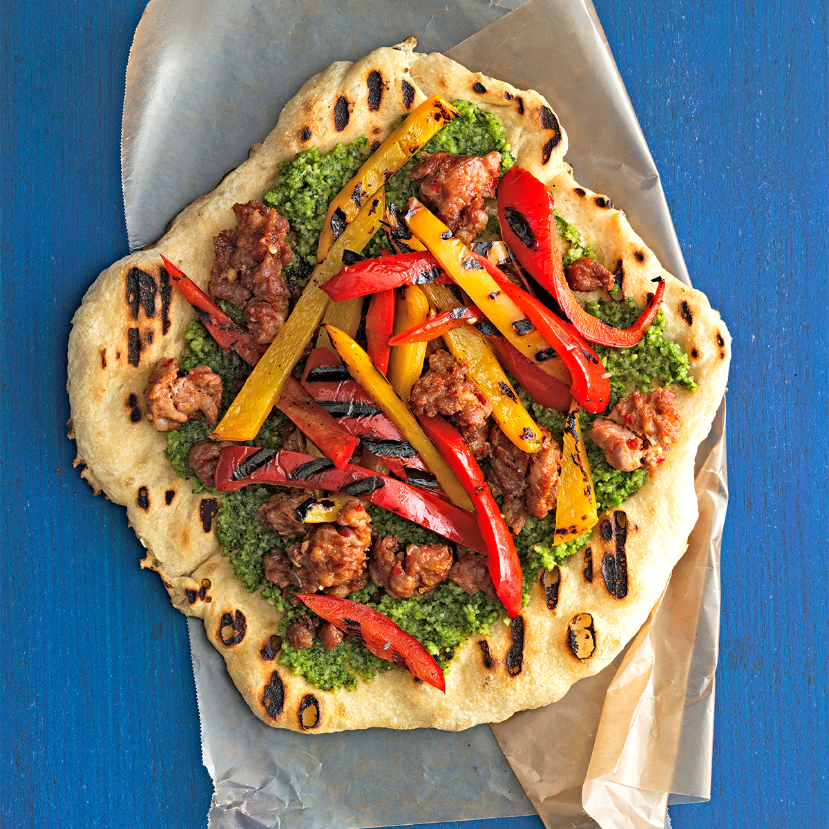 Hot Sausage & Sweet Pepper Pizzas with Almond Pesto 
