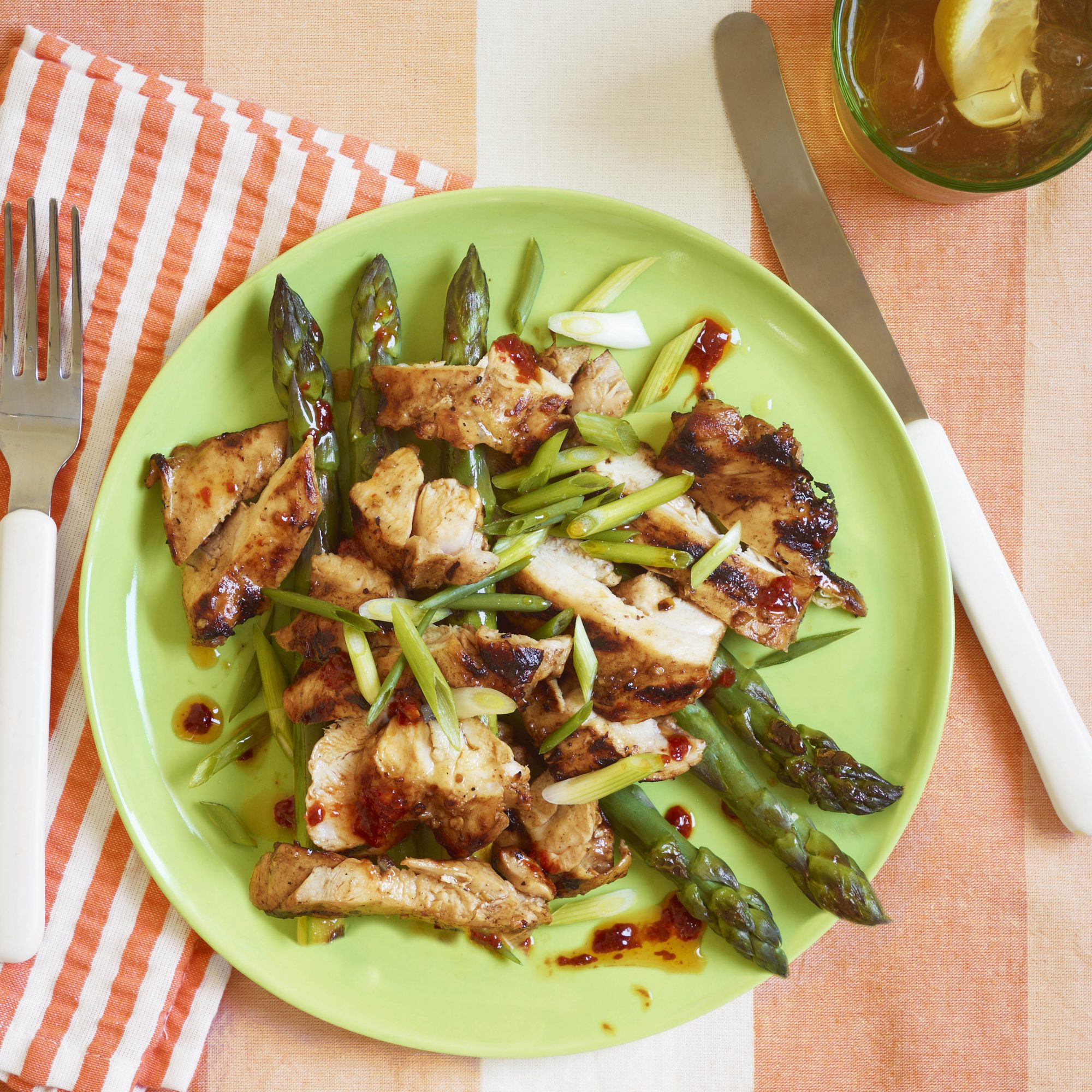 Grilled Sweet-and-Sticky Chicken Thighs with Asparagus and Harissa