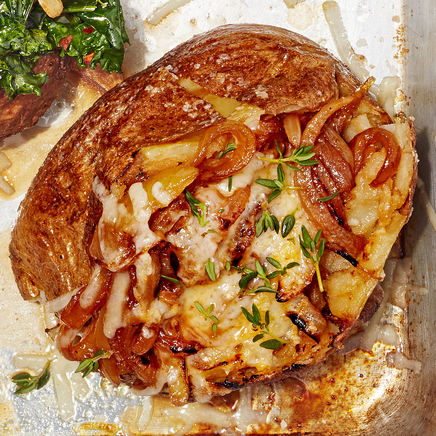 french onion soup baked potato in pan