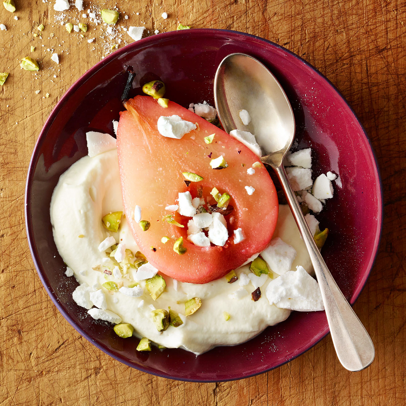 Cranberry-Poached Pears with Vanilla Meringue Crunch