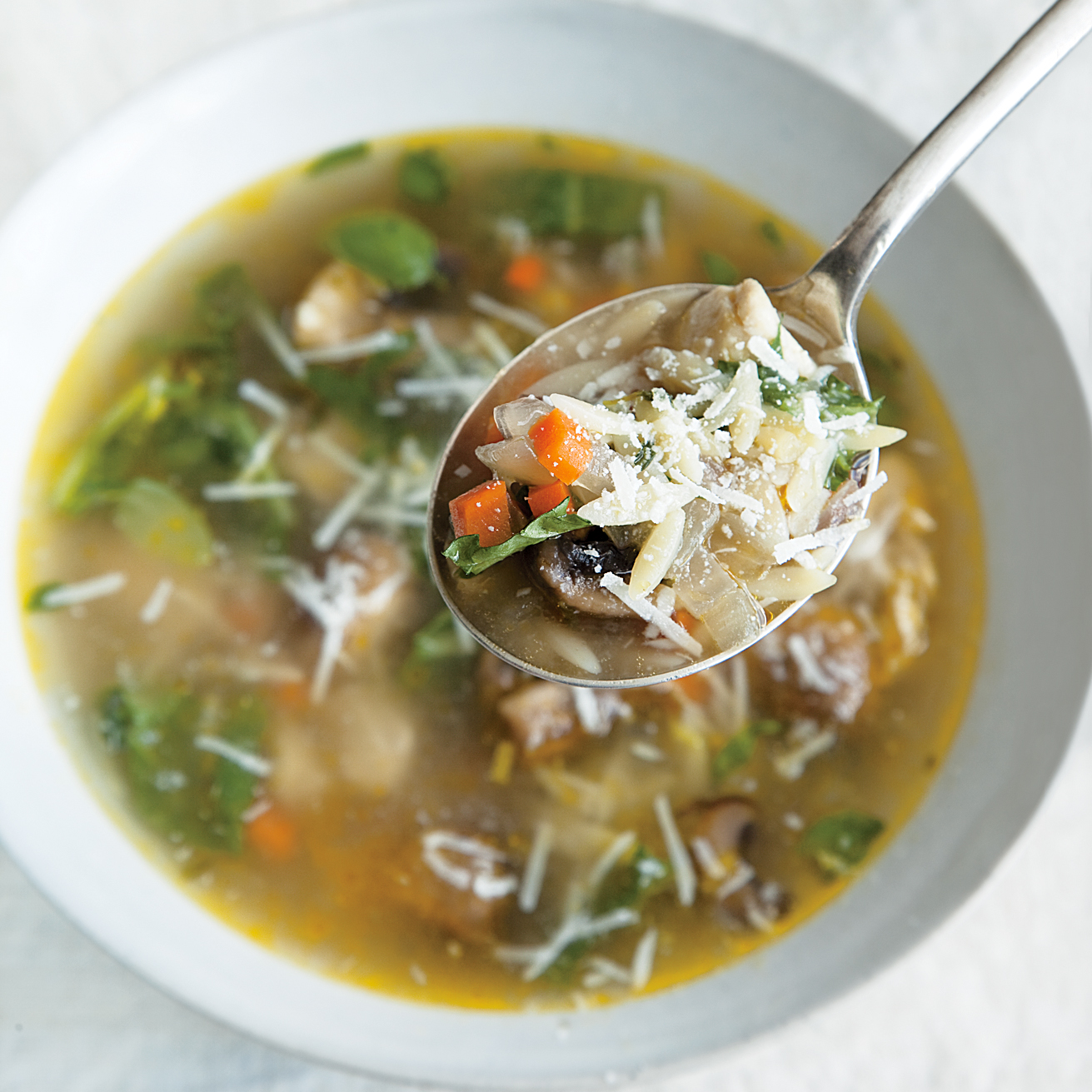 Chicken-and-Orzo Soup with Arugula and Basil 