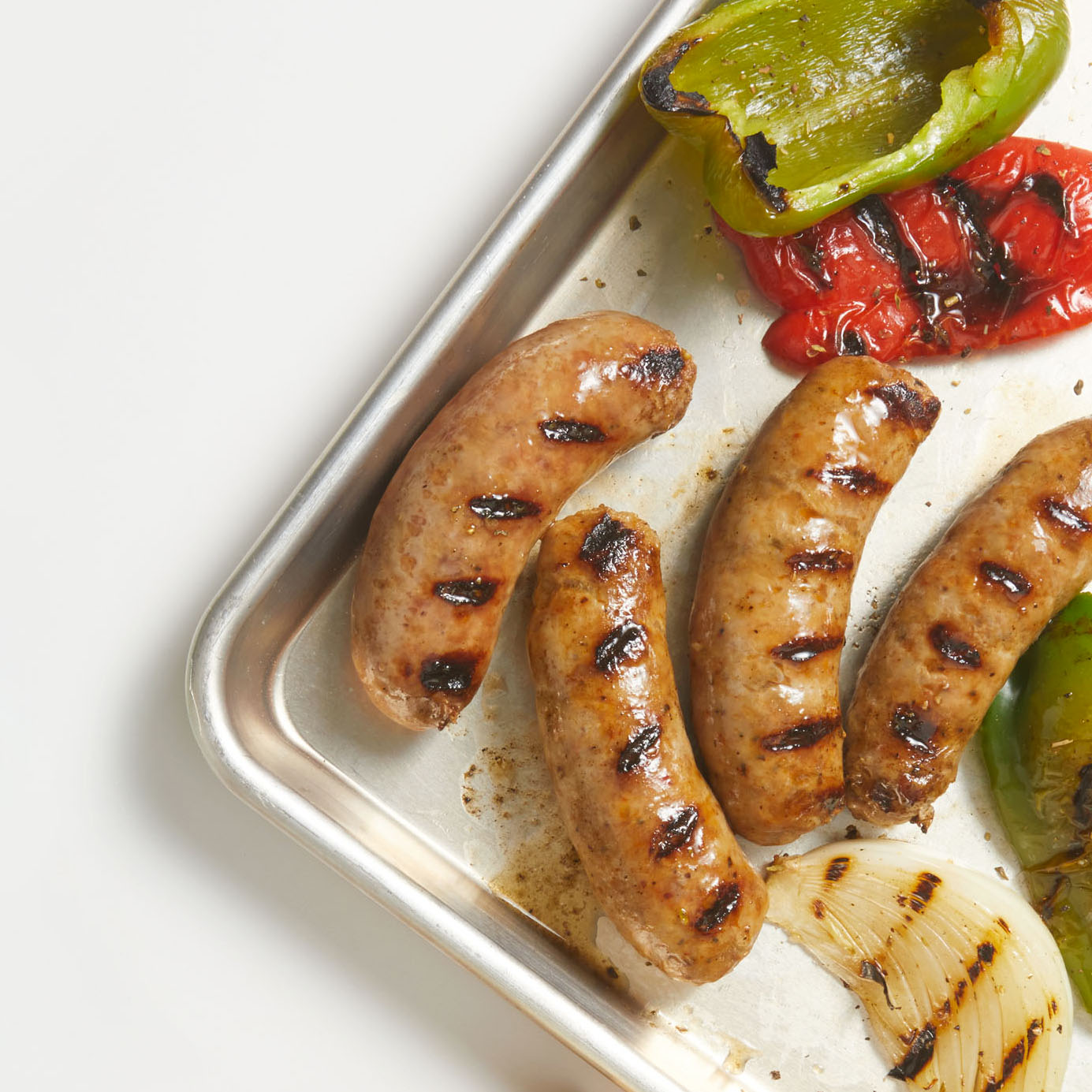 Grilled sausages, peppers and onions