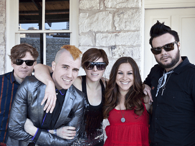 The Neon Trees pose with Steve Madden Music?s Allison Hagendorf.