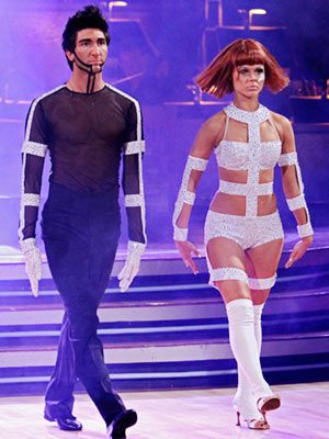 Dancing With the Stars | EVAN LYSACEK AND ANNA TREBUNSKAYA: FUTURISTIC CHA CHA CHA She's Lady Chacha/Leeloo from The Fifth Element ; he's....a marionette David Schwimmer. With visible nipples. Read