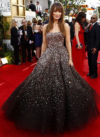 Olivia Wilde, Golden Globe Awards 2011 | Olivia Wilde It was hard to take our eyes off Wilde's spectacular Marchesa gown, but it was equally hard &mdash; and not in a good