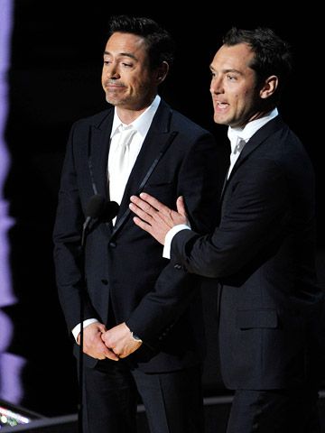 Jude Law, Robert Downey Jr. | ?Proving not all Oscar repartee needs to be strained and clumsy ( ahem, James Franco ), Sherlock Holmes costars Robert Downey Jr. and Jude Law