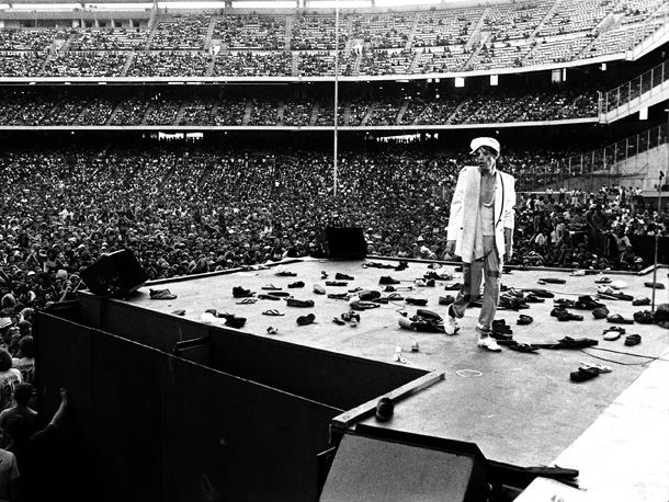 Mick Jagger, The Rolling Stones | Lynn Goldsmith: ''For some reason (one of love, of course) people started throwing their shoes. Maybe because it was an afternoon show and the band
