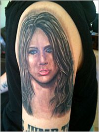 Man has 15 Miley Cyrus tattoos; how many do you have? 