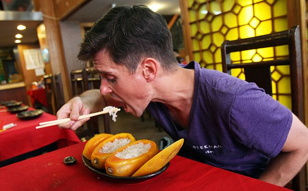 Dining on frog fallopian tubes (China)