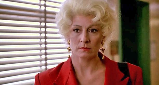 Pay no mind to her name, this broad is no delicate flower. Lilly (Anjelica Huston) is canny and fearless, cheating her mob bosses even as