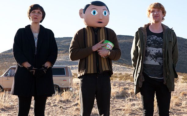 Michael Fassbender plays a saintly-kook man-child of an indie-rock lead singer who wears a big, round papier-mach&eacute; head that he never takes off. He's literally