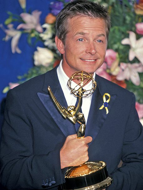 Michael J. Fox with his Outstanding Lead Actor in a Comedy Series Emmy for Spin City