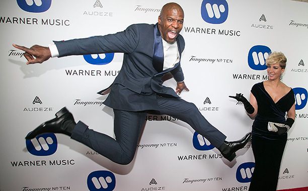 Terry Crews and Rebecca King-Crews at Warner Music Group's Celebration For The 58th Annual Grammy Awards