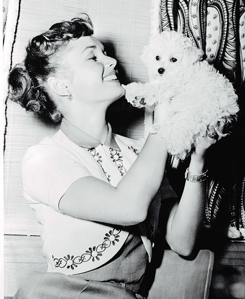 Debbie Reynolds With Her Dog in the Late 1950s