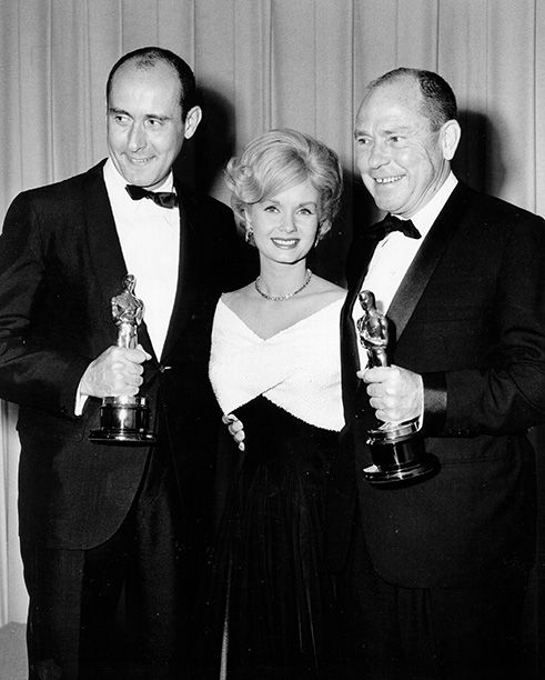 Debbie Reynolds With Henry Mancini and Johnny Mercer at the Oscars on April 8, 1963