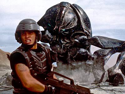 Starship Troopers, Casper Van Dien | The aliens in Paul Verhoeven's spectacularly gory space opus aren't lanky green mutes or glowing orbs or humanoid imposters. They're bugs &mdash; giant, man-eating things