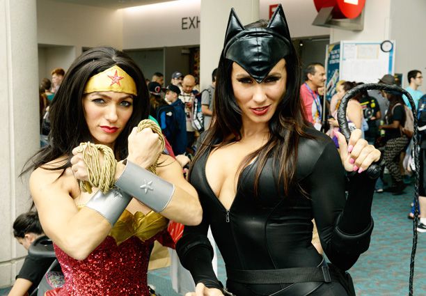 A Wonder Woman Cosplayer and a Catwoman Cosplayer