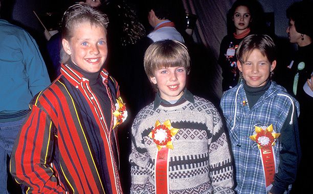 Jonathan Taylor Thomas With Zachery Ty Bryan and Taran Noah Smith at the 62nd Annual Hollywood Christmas Parade on November 28, 1993