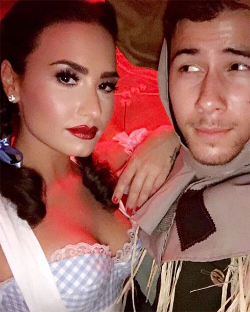 Demi Lovato and Nick Jonas as The Wizard of Oz's Dorothy and The Scarecrow