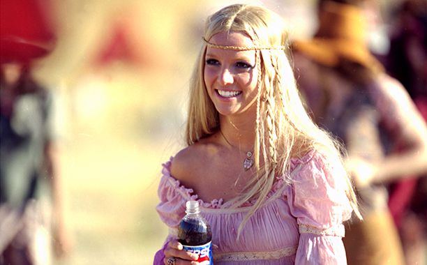 GALLERY: Britney Spears Through the Years: GettyImages-903158.jpg January 31, 2002 Britney Spears takes part in a new Pepsi commercial in this photo